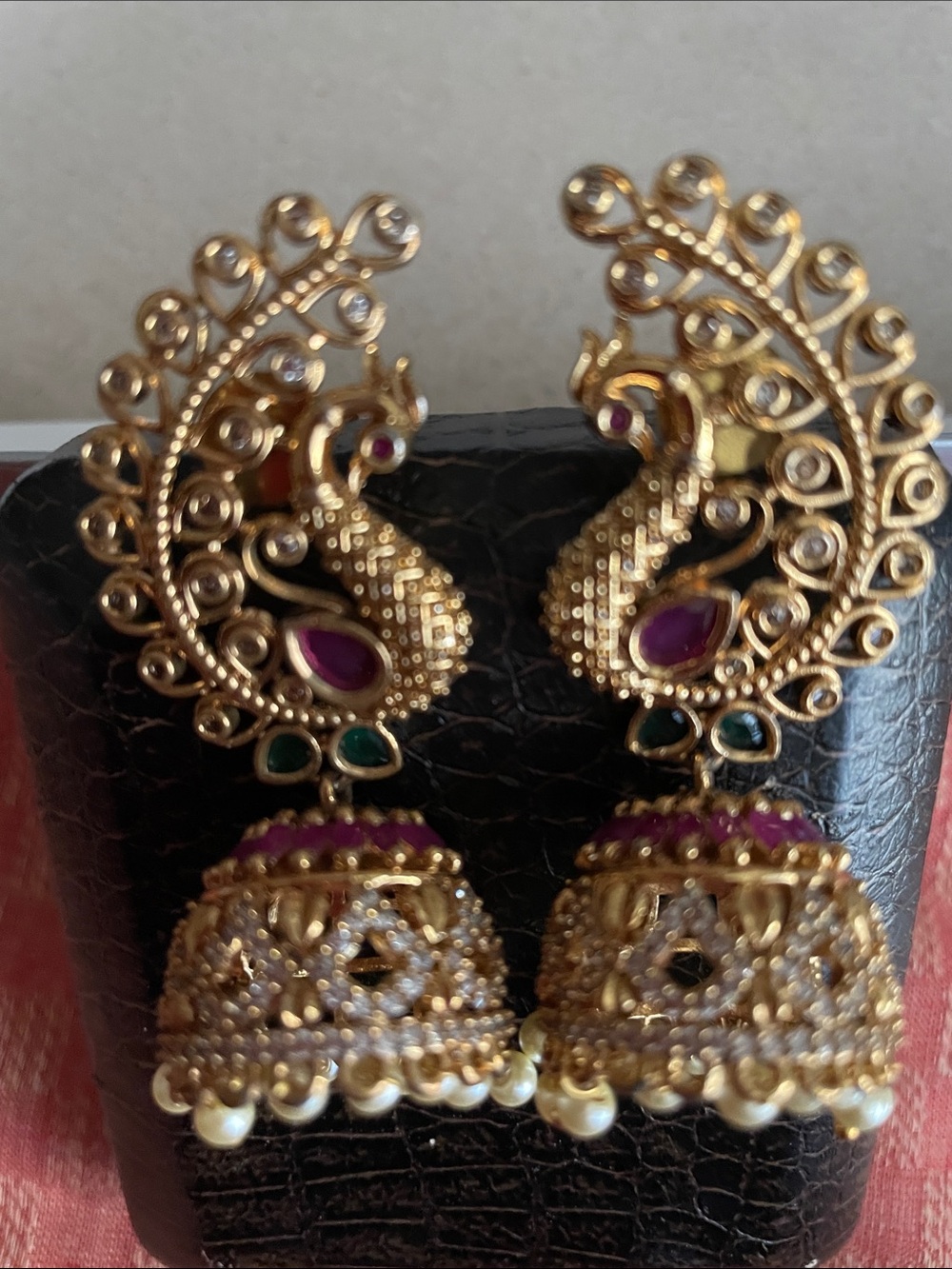 Gold Peacock Jhumka Earrings with Pink and Green Stones